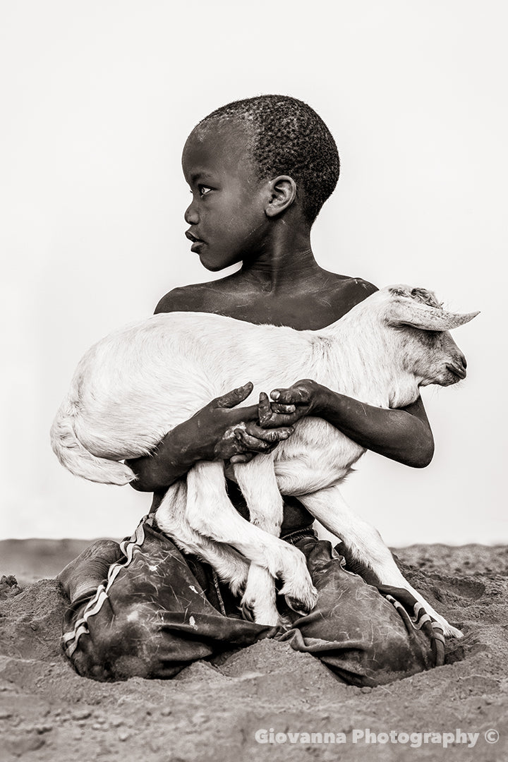 Selam - Boy with goat