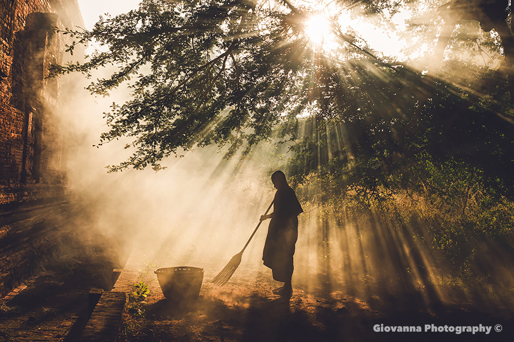 Sweeping Beneath The Sacred Light Bagan