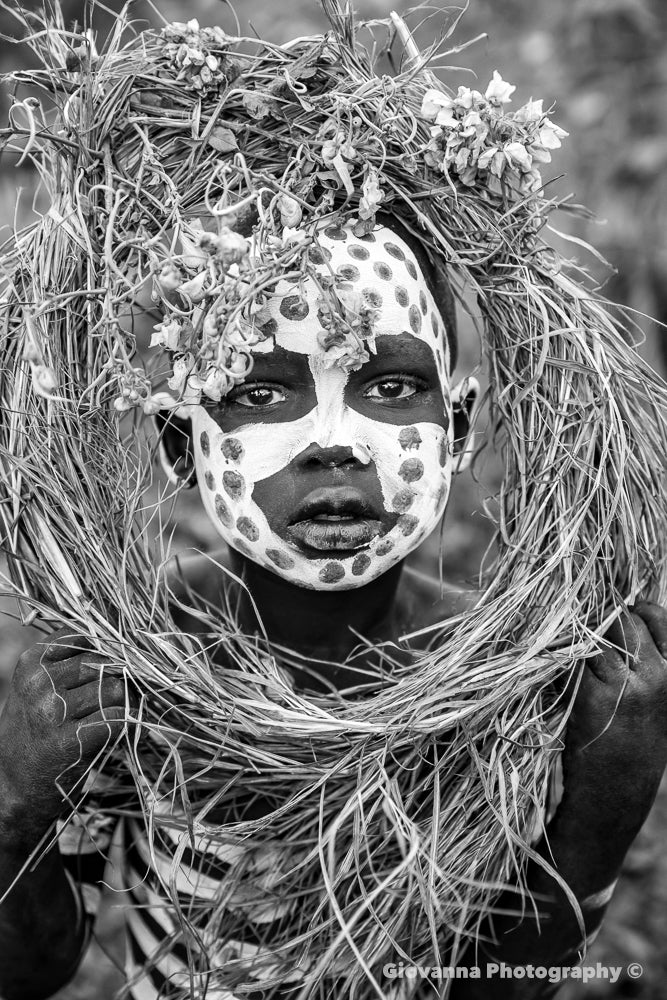 ZANE - Young Suri Boy with leaves and branches
